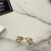 Earrings claw gold